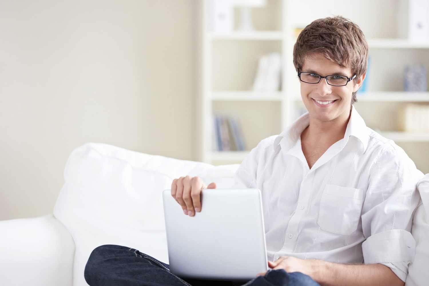 A young man with laptop